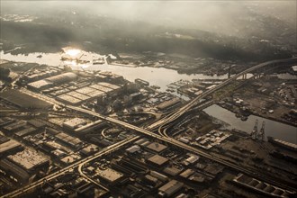 Aerial view of bridge over urban river