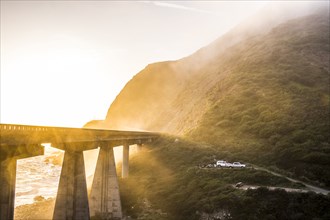 Fog on bridge near ocean