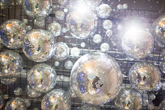Low angle view of disco balls on ceiling