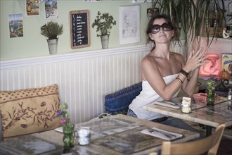 Caucasian woman sitting in cafe