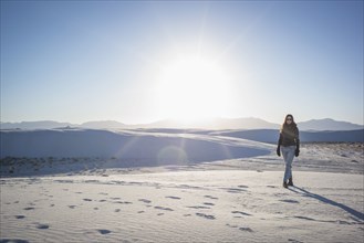 Caucasian woman walking in White Sands National Park