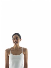 Waist up view of smiling woman standing