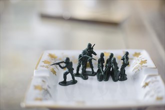 Toy soldiers on antique chair
