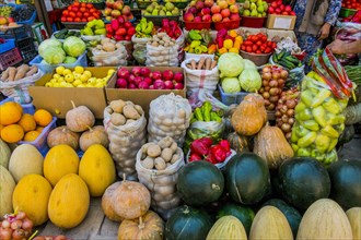 Variety of fresh fruit and vegetables at market