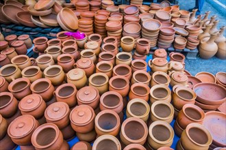 Clay pots and bowls on floor
