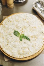 White pizza with basil