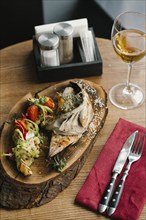 Fish and vegetables with white wine