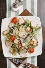 Salad with croutons on plate