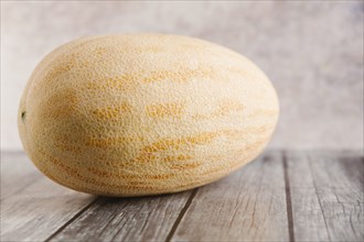 Melon on wooden table