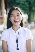 Portrait of smiling Asian woman