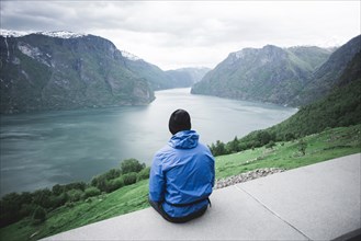 Caucasian man admiring scenic view of river