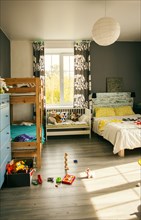 Bunk beds and crib in bedroom of child