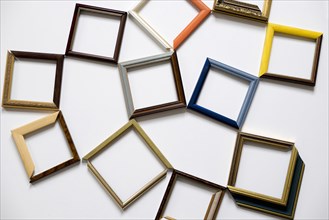 Picture frames on white table
