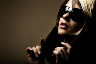 Portrait of Caucasian teenage girl wearing sunglasses