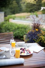 Healthy breakfast on outdoor patio table