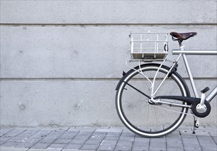 Bicycle parked on urban sidewalk