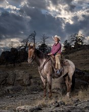 Portrait of Caucasian woman posing on horse
