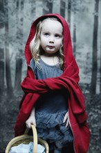 Girl dressed as little red riding hood