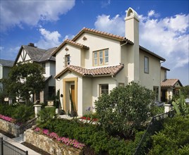Front exterior contemporary Spanish style home