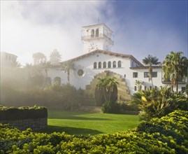 Exterior Santa Barbara Courthouse and sunken garden through morning mist
