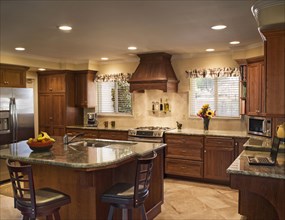 Traditional kitchen with stools at breakfast bar