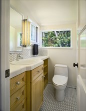 Traditional half bath with white tile