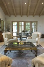 Coffee table and armchairs in traditional living room
