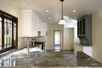 Granite countertops in traditional kitchen