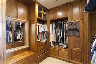 Large wooden walk in closet