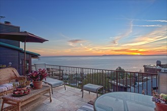 Ocean view patio at sunset