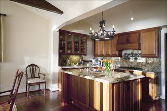 Large island in traditional kitchen