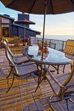 Table on patio with ocean view