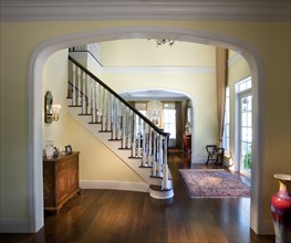 Archway and grand staircase in plantation house