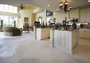 Marble floors through out elegant kitchen