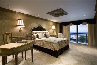 Elegant master bedroom with marble desk