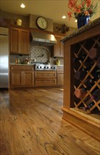 Wooden wine storage rack in domestic kitchen