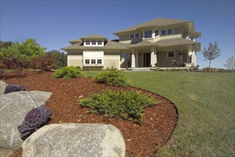 Exterior of a single family home with lawn in front