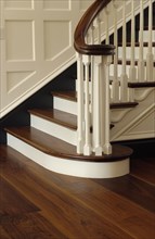 Walnut staircase and hardwood floors