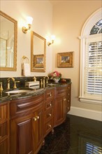 Traditional bathroom with granite floors and countertop