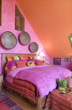 Bright pink and orange bedroom