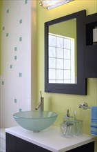 Contemporary bathroom with green walls