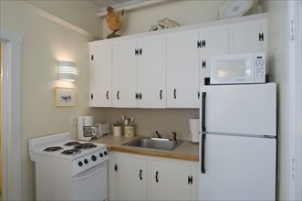 Small white apartment kitchen