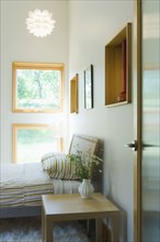View through doorway into modern bedroom
