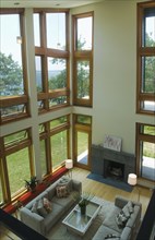 High angle view contemporary living room with several windows