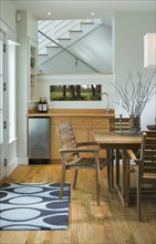 Detail contemporary dining room with wet bar