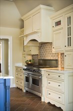 Detail traditional kitchen with stainless steel double oven