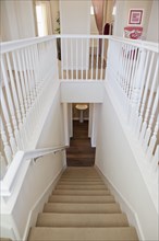 High angle view of stairs with railings at home