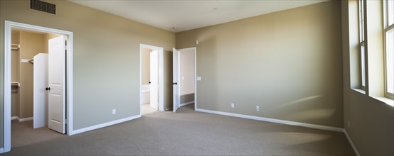 Empty room with open doors