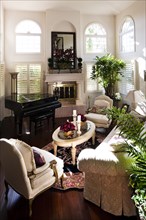 Seating furniture with piano in the living room at home