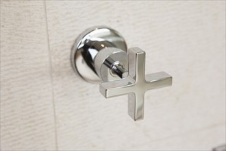 Close-up of shower tap at home